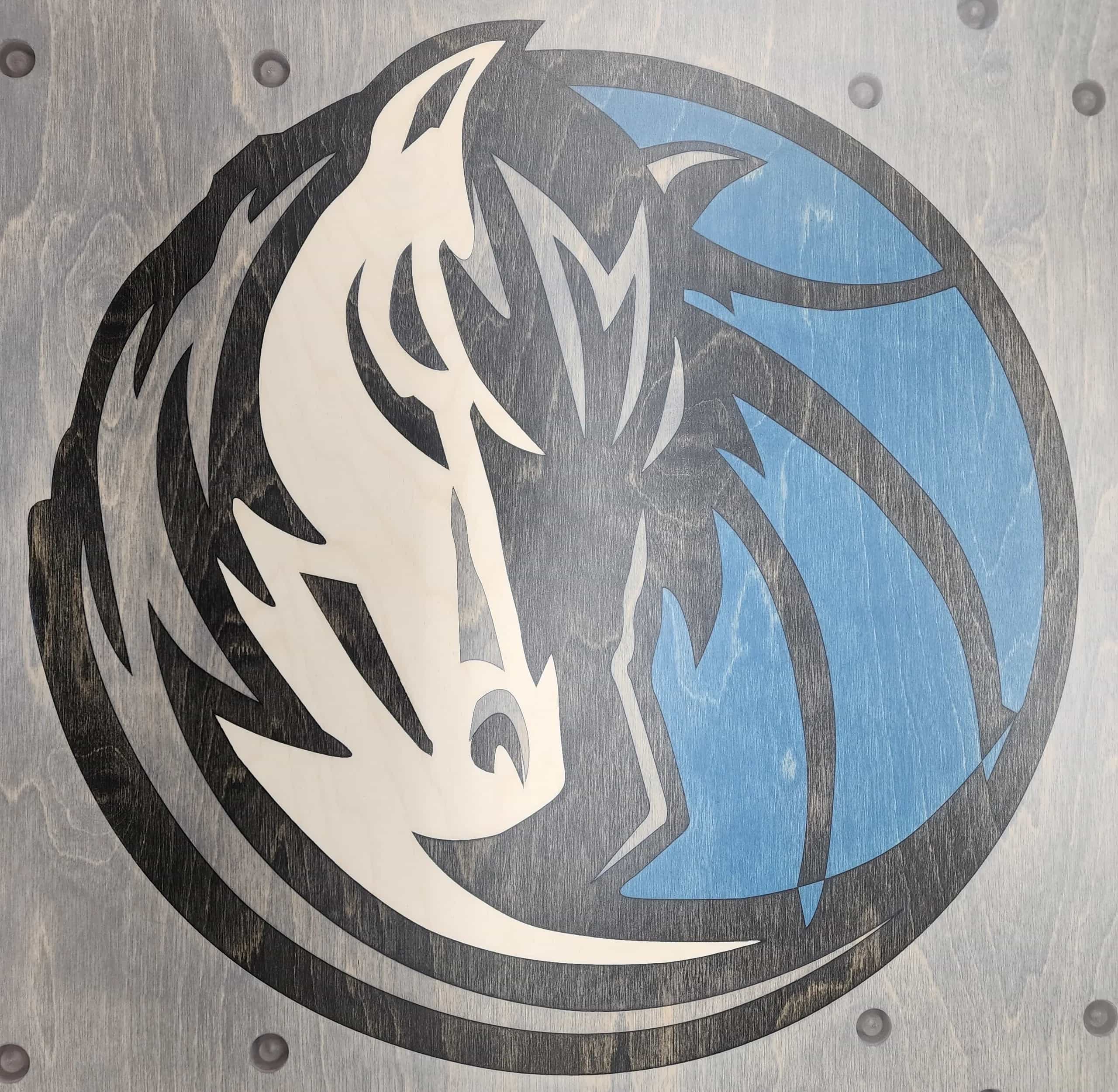 YoreBoard cornhole board surface showing Mavericks team emblem and integrated LED scoring.
