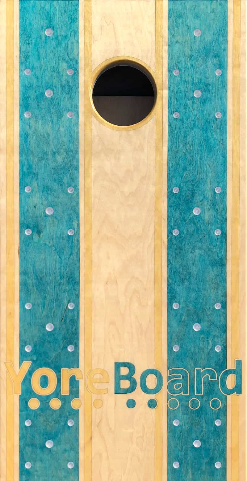 Straight-on view of the deck of a cornhole board.