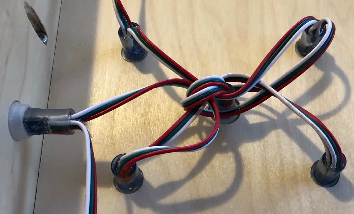Image of a proper way to manage LED wires on a YoreBoard cornhole board.