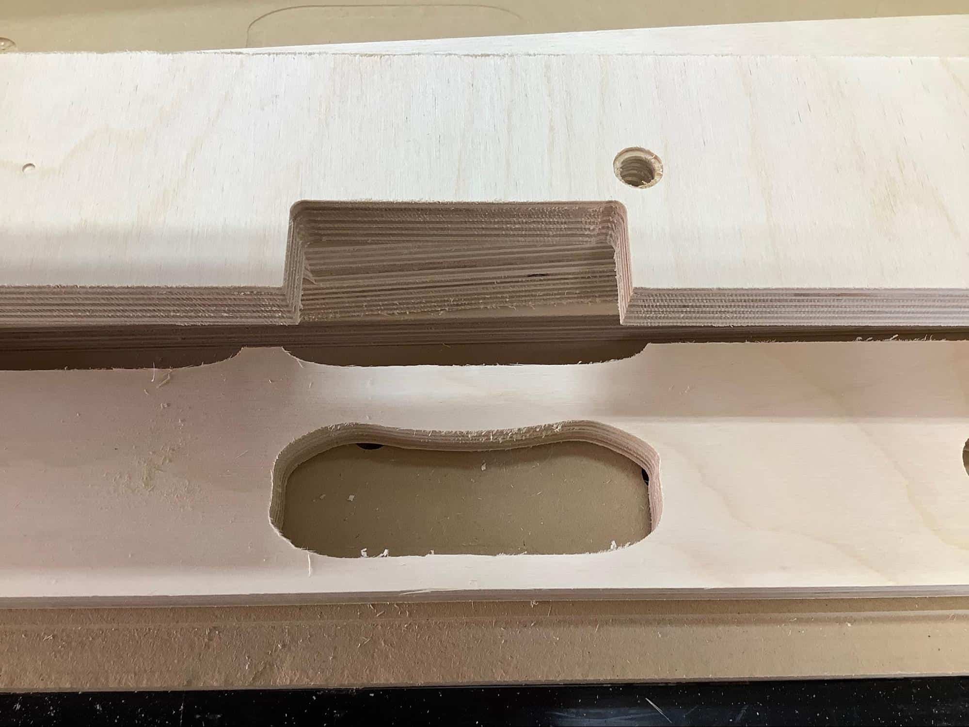 Image of a handle and power pack slot in need of roundovers on a YoreBoard cornhole board.