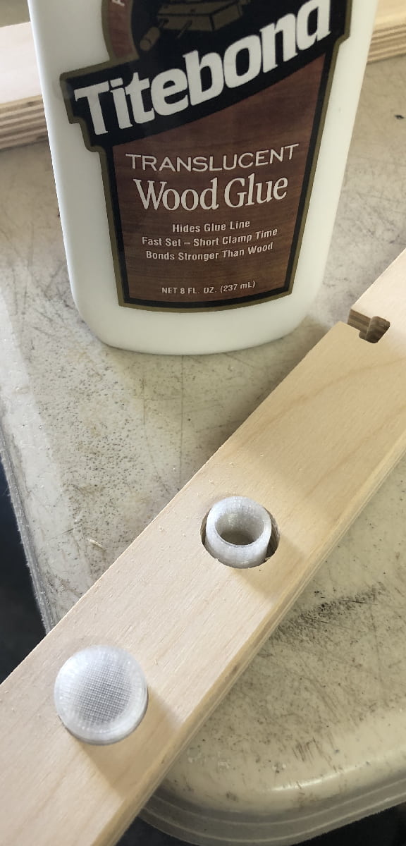 Image demonstrating how to install LED mounting caps into YoreBoard score tower spine.